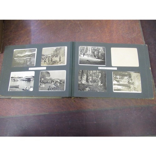 303 - Four photograph albums containing a quantity of 19th Century and later photographs of Canada, Fiji, ... 