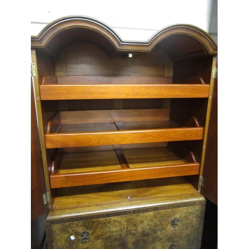 2042 - Mid 20th Century walnut linen press in Queen Anne style, the double dome top with two doors enclosin... 