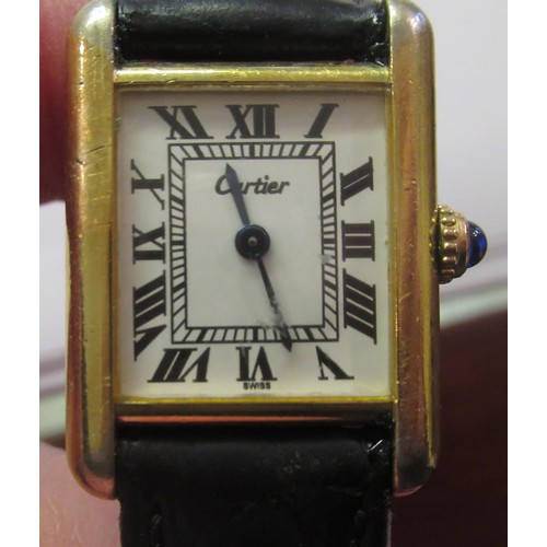 889 - Must de Cartier ladies silver gilt tank silver wristwatch, the white dial with Roman numerals, on a ... 