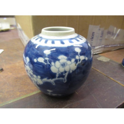 486 - Chinese blue and white prunus blossom decorated ginger jar and cover, together with two similar, sma... 