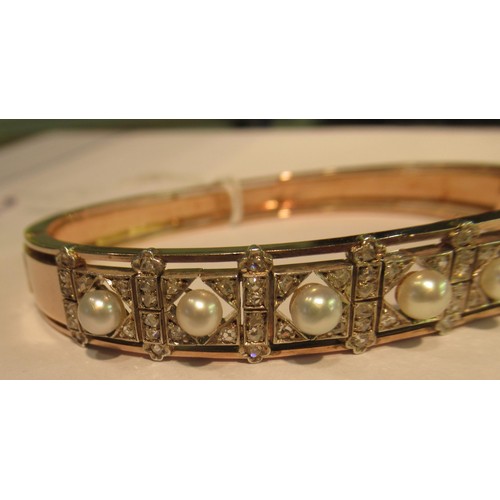 1031 - Late 19th / early 20th Century rose gold cultured pearl and rose cut diamond bangle, in the original... 