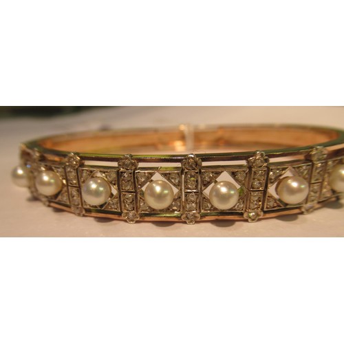 1031 - Late 19th / early 20th Century rose gold cultured pearl and rose cut diamond bangle, in the original... 