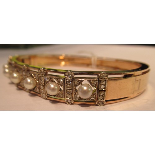 1031 - Late 19th / early 20th Century rose gold cultured pearl and rose cut diamond bangle, in the original... 