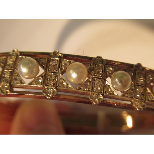 1031 - Late 19th / early 20th Century rose gold cultured pearl and rose cut diamond bangle, in the original... 