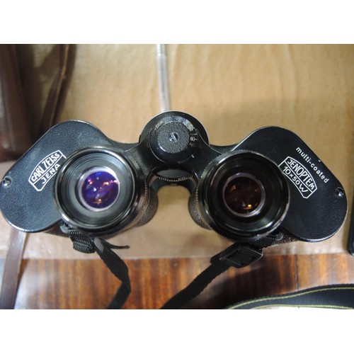 264 - Pair of leather cased Zeiss binoculars