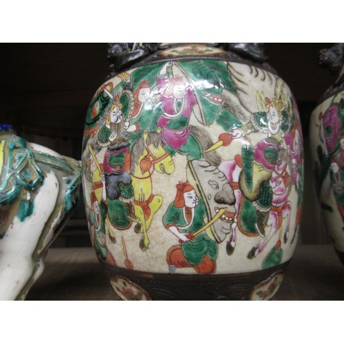 558 - Pair of 19th Century Chinese crackleware enamel decorated vases, decorated with various figures on h... 