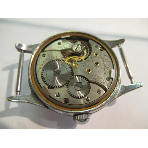 1044 - Small steel cased Omega wristwatch with enamel dial, having subsidiary seconds (lacking hand) with l... 