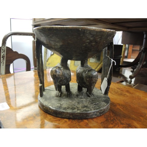 137H - Nigerian Yoruba tribe carved wooden pedestal bowl with stylised figures of birds to the base, 19cm x... 