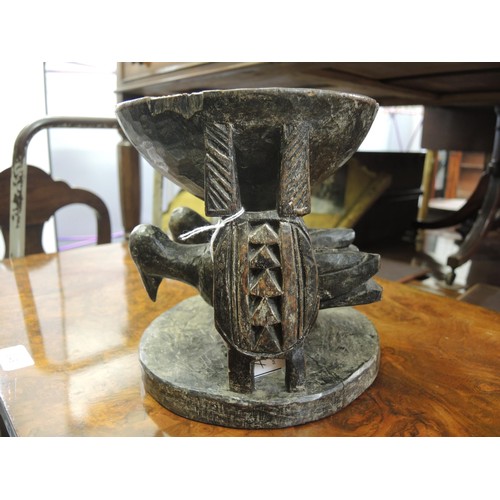 137H - Nigerian Yoruba tribe carved wooden pedestal bowl with stylised figures of birds to the base, 19cm x... 