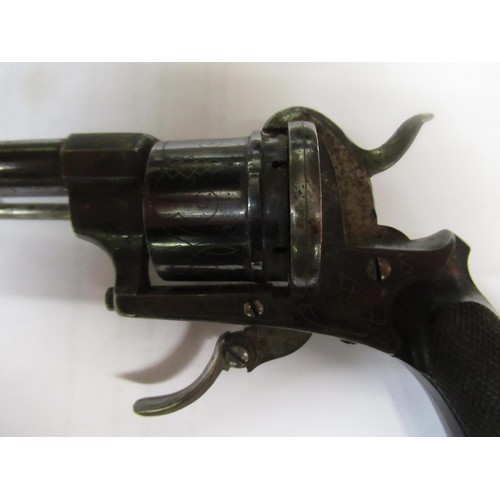 275 - Late 19th Century / early 20th Century rim fire revolver with folding trigger and knurled ebony grip... 