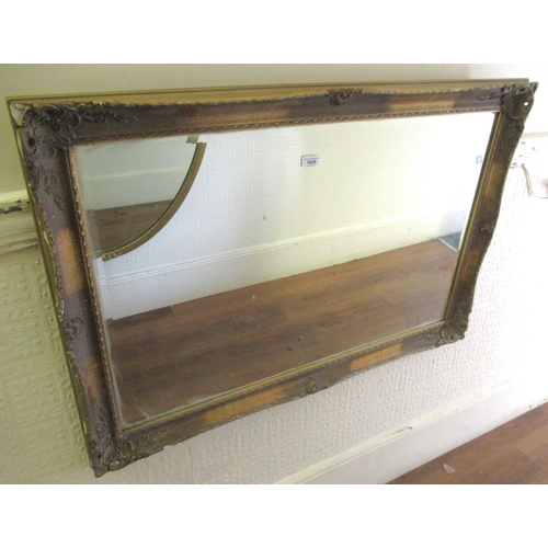 Modern rectangular gilt framed wall mirror with bevelled plate (at fault)