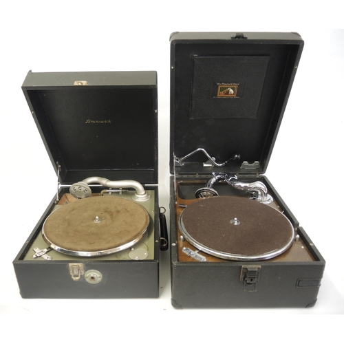 100 - HMV portable wind-up gramophone, together with a similar Brunswick gramophone and three G. E. C. Bus... 