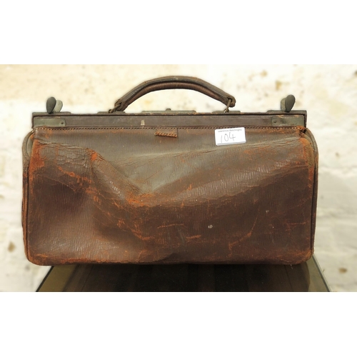 104 - Small leather Gladstone bag and a patinated copper log bin