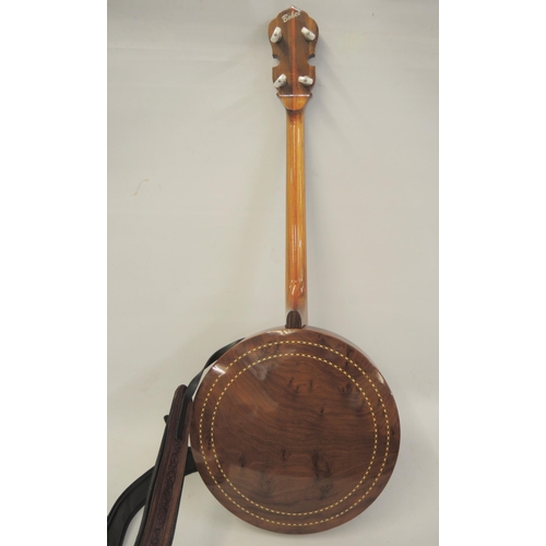 131 - Bohee four string banjo with inlaid walnut back and sides in a fitted case