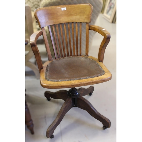 Early 20th Century beechwood slatback revolving office chair