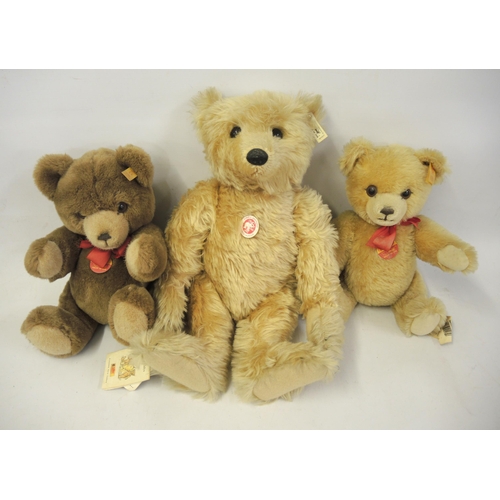 160 - Large Steiff traditional teddy bear with original labels, together with two similar, smaller bears (... 