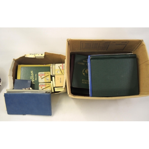 185 - Two boxes containing a collection of World stamps including a small quantity of loose leaves, albums... 