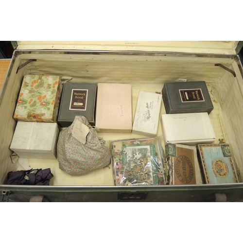 203 - Travelling trunk containing a large collection of vintage wooden jigsaw puzzles by Victory and other... 