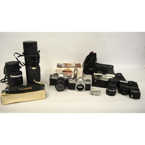 209 - Canon AE1 camera and a Canon AV1 camera with lenses and accessories