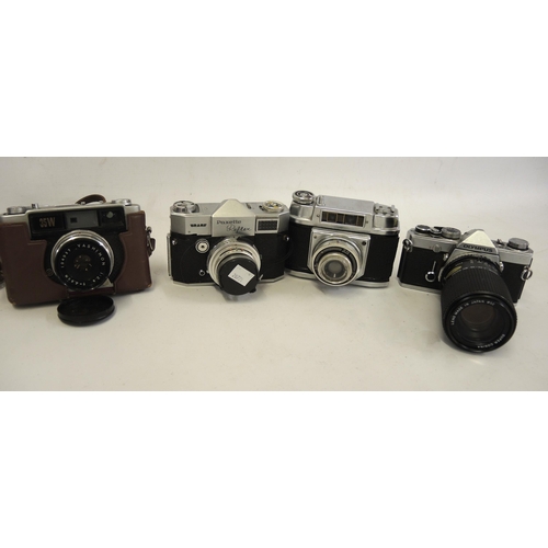 211 - Quantity of 35mm cameras with lenses including a Braun Paxette Reflex and an Olympus OM-1N