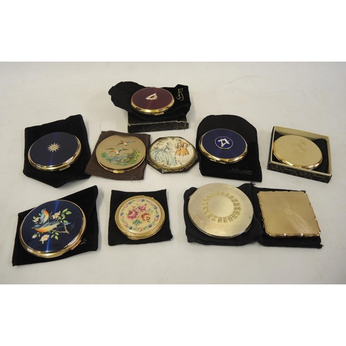 243 - Small collection of various compacts, mainly Stratton, some with original boxes and packaging