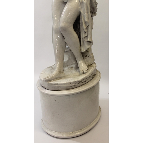 426 - Large 20th Century white crackle glazed pottery figure of a semi nude girl on an oval plinth base