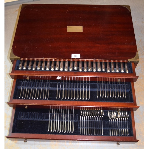 489 - Silver plated twelve place setting part canteen of cutlery in a brass mounted three drawer case