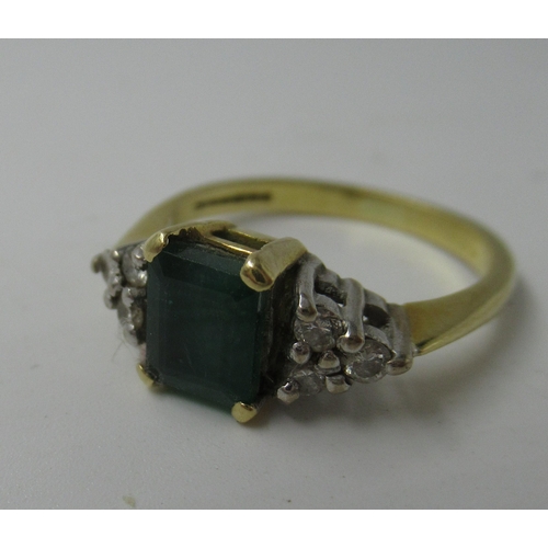 571 - 18ct Gold emerald and diamond set dress ring, the centre stone approximately 6mm square