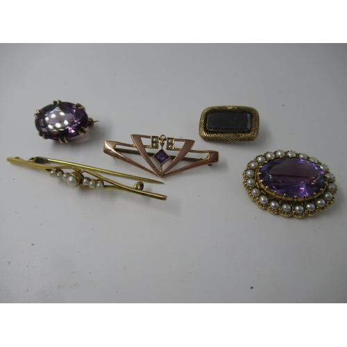 587 - Small yellow metal amethyst and split pearl oval brooch, similar smaller brooch, 19th Century mourni... 