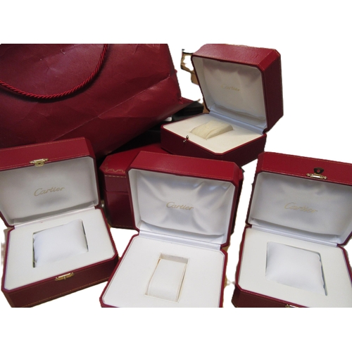 602 - Group of five various Cartier red leather watch boxes