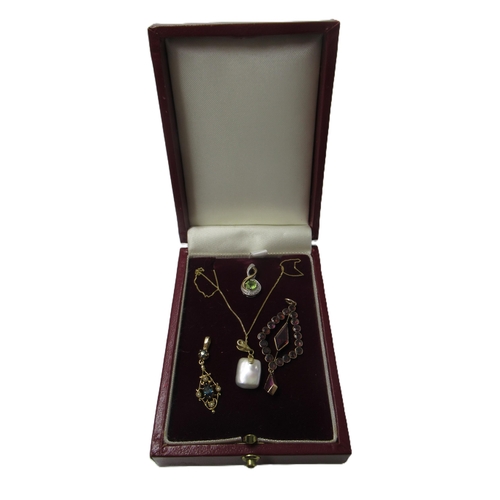 603 - 9ct Gold and cultured pearl pendant on chain, two small 9ct gold and gem set pendants and a garnet p... 