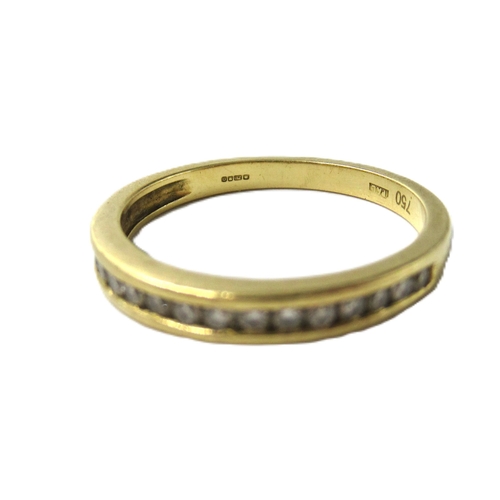 605 - Small 18ct gold channel set diamond half eternity ring, 2.5g