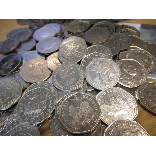 620B - Tin containing a large collection of scarce 50p circulated collectors coins, including Olympics 2012... 