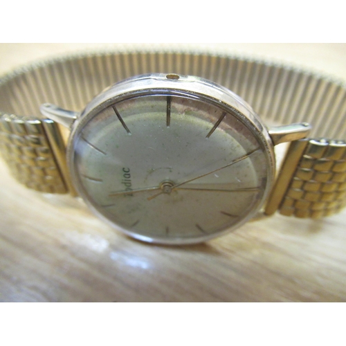 643 - Gentlemans 9ct gold wristwatch by Zodiac with plated bracelet strap , movement at fault