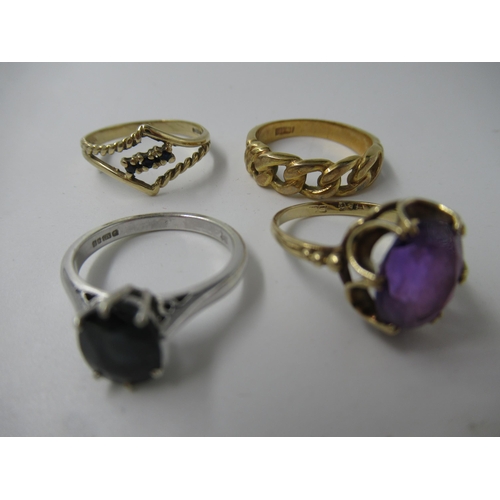 645 - Group of four various rings, three 9ct and one yellow metal  9gm gross