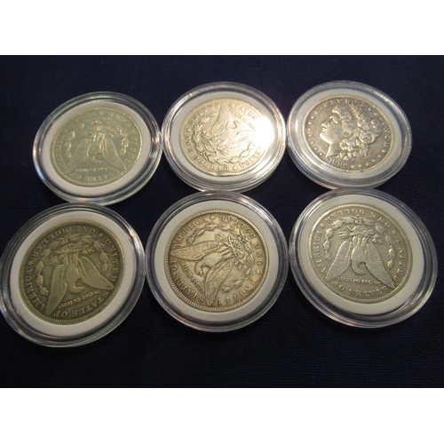 673 - Group of six antique U.S. silver dollars, 1878, 1882, 1882, 1884, 1896 and 1900