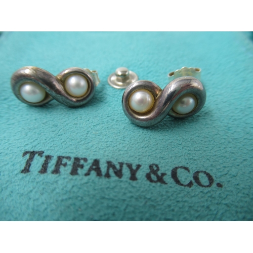 681 - Three pairs of Tiffany silver earrings in original pouches