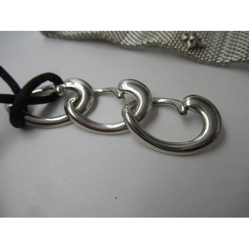 689 - Links of London silver chain link choker, together with a Links three heart pendant on cord