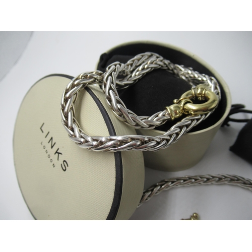 690 - Links of London silver chain link necklace, together with a matching bracelet, having gilt metal cla... 