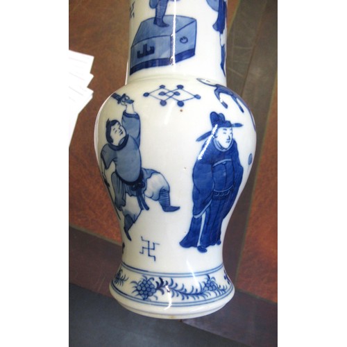 402 - Pair of Chinese porcelain baluster form flared rim vases, blue and white decorated with figures, 26c... 