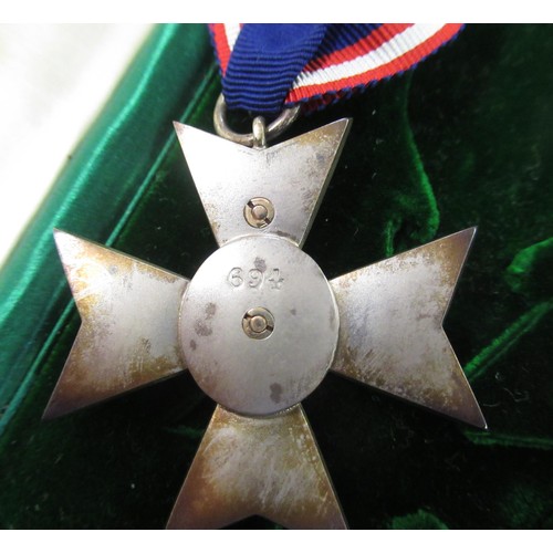 177 - Member of the Royal Victorian Order (5th Class) medal in fitted case, together with a French insigni... 