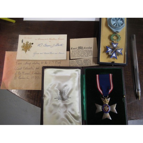 177 - Member of the Royal Victorian Order (5th Class) medal in fitted case, together with a French insigni... 