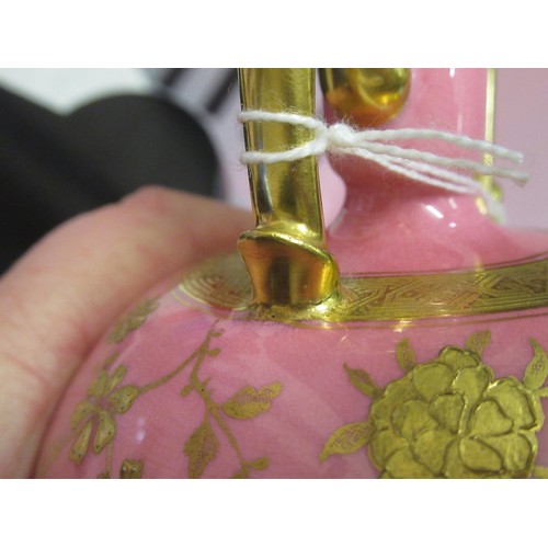 348 - Late 19th Century Mintons two handled bottle shaped vase with gilded floral decoration on a pink gro... 