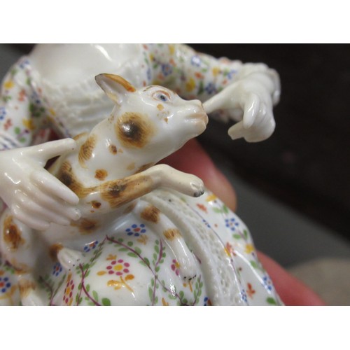 349 - Small late Meissen figure of a seated lady with cat, 13cm high