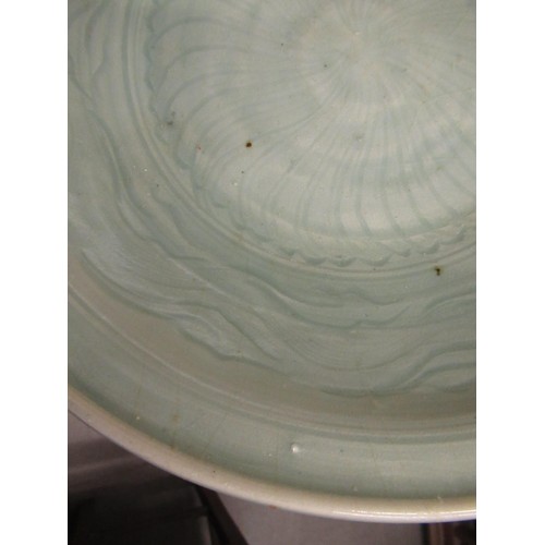 312 - Chinese Celadon circular deep dish with shallow incised decoration, 32cm diameter, with a hardwood s... 