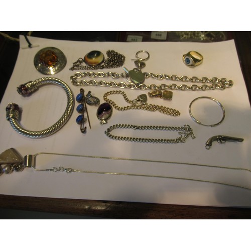 677 - Box containing a small quantity of silver and other costume jewellery, including a citrine set brooc... 