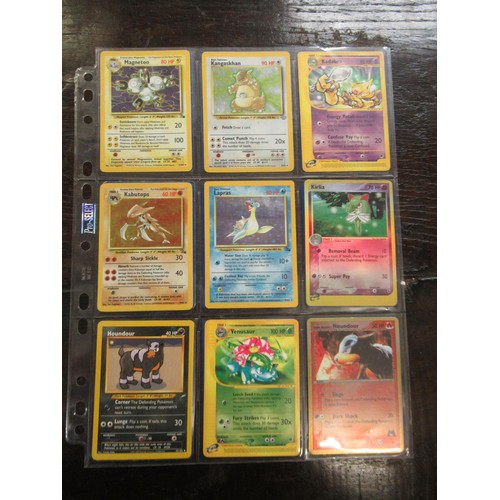 222 - Seven double sided sheets housing a collection of mainly ' Holo ' Pokémon cards including Fossil, Ju... 