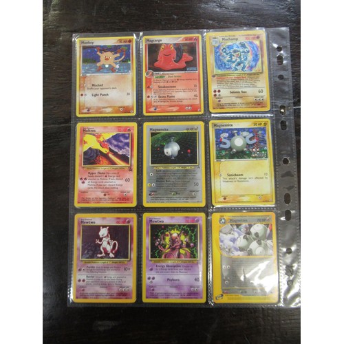 222 - Seven double sided sheets housing a collection of mainly ' Holo ' Pokémon cards including Fossil, Ju... 