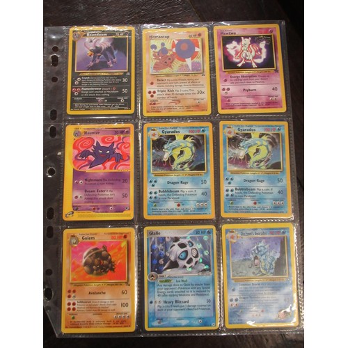 222 - Seven double sided sheets housing a collection of mainly ' Holo ' Pokémon cards including Fossil, Ju... 