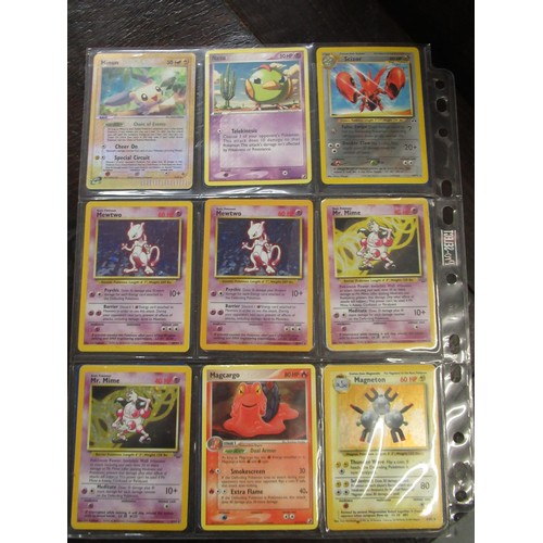 222 - Seven double sided sheets housing a collection of mainly ' Holo ' Pokémon cards including Fossil, Ju... 